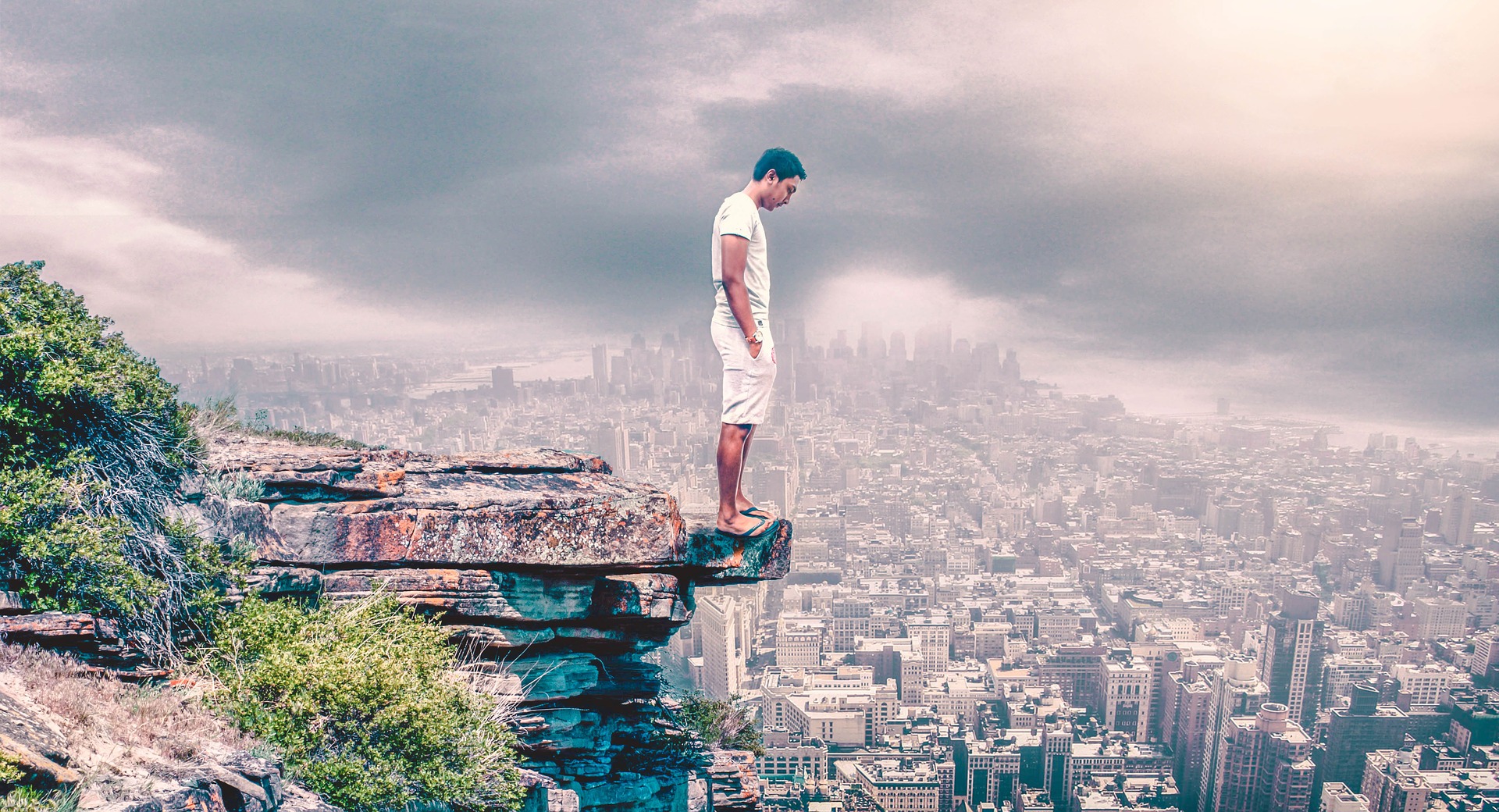 young man on a cliff