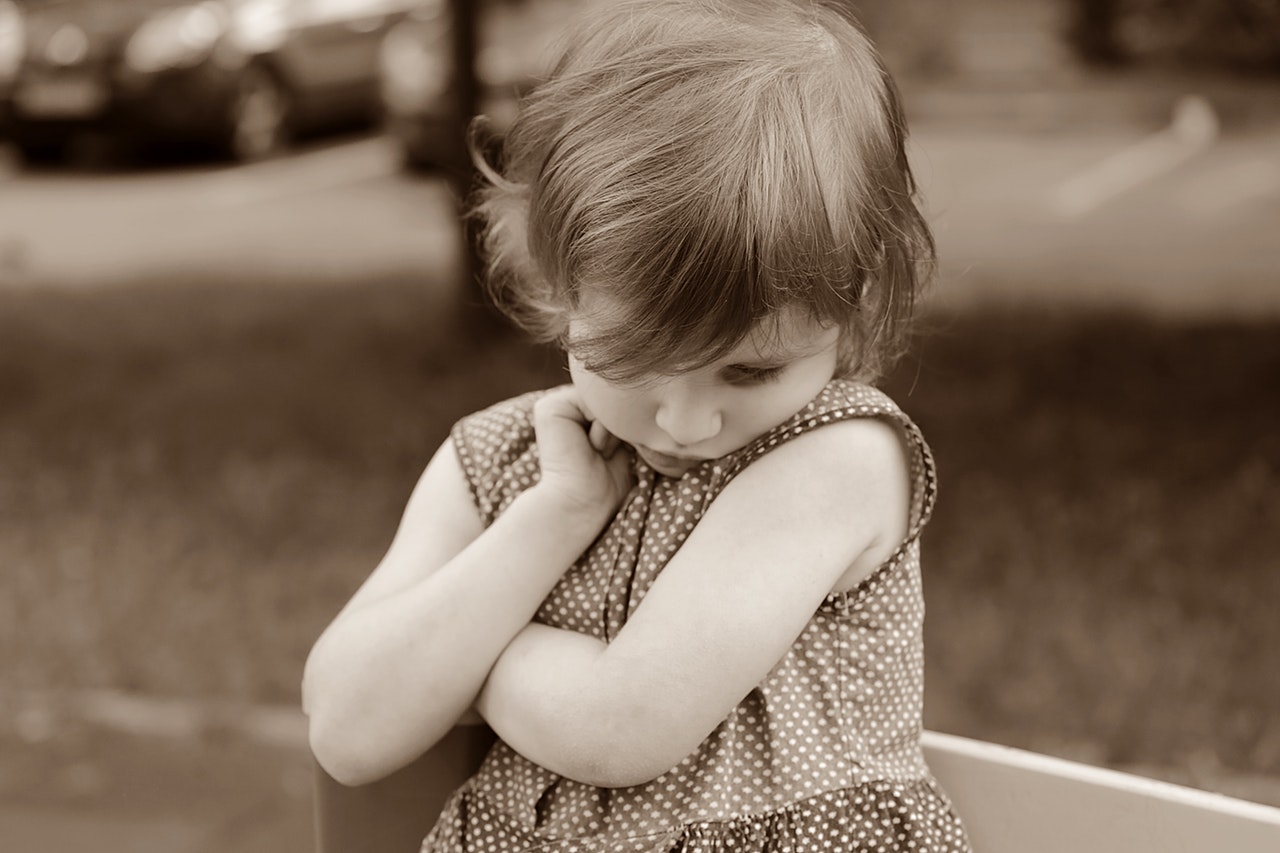 shy girl in sepia